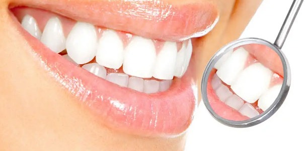 Ультразвуковая чистка, лечение и протезирование зубов в стоматологии «Смайл». Скидка до 86%
